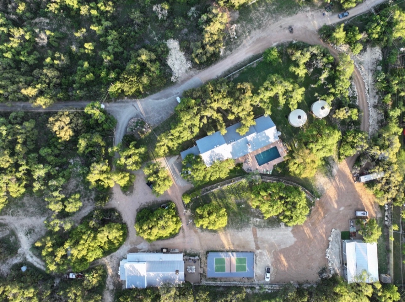 Aerial view of AWKN Ranch's twelve private acres outside Austin, Texas